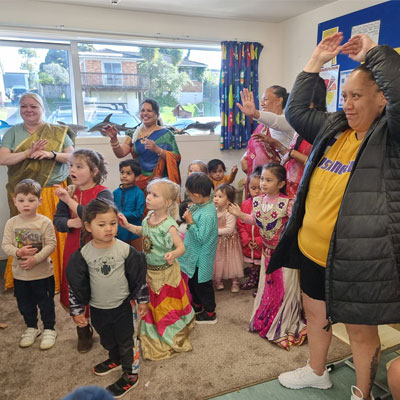 Children and teachers celebrating together